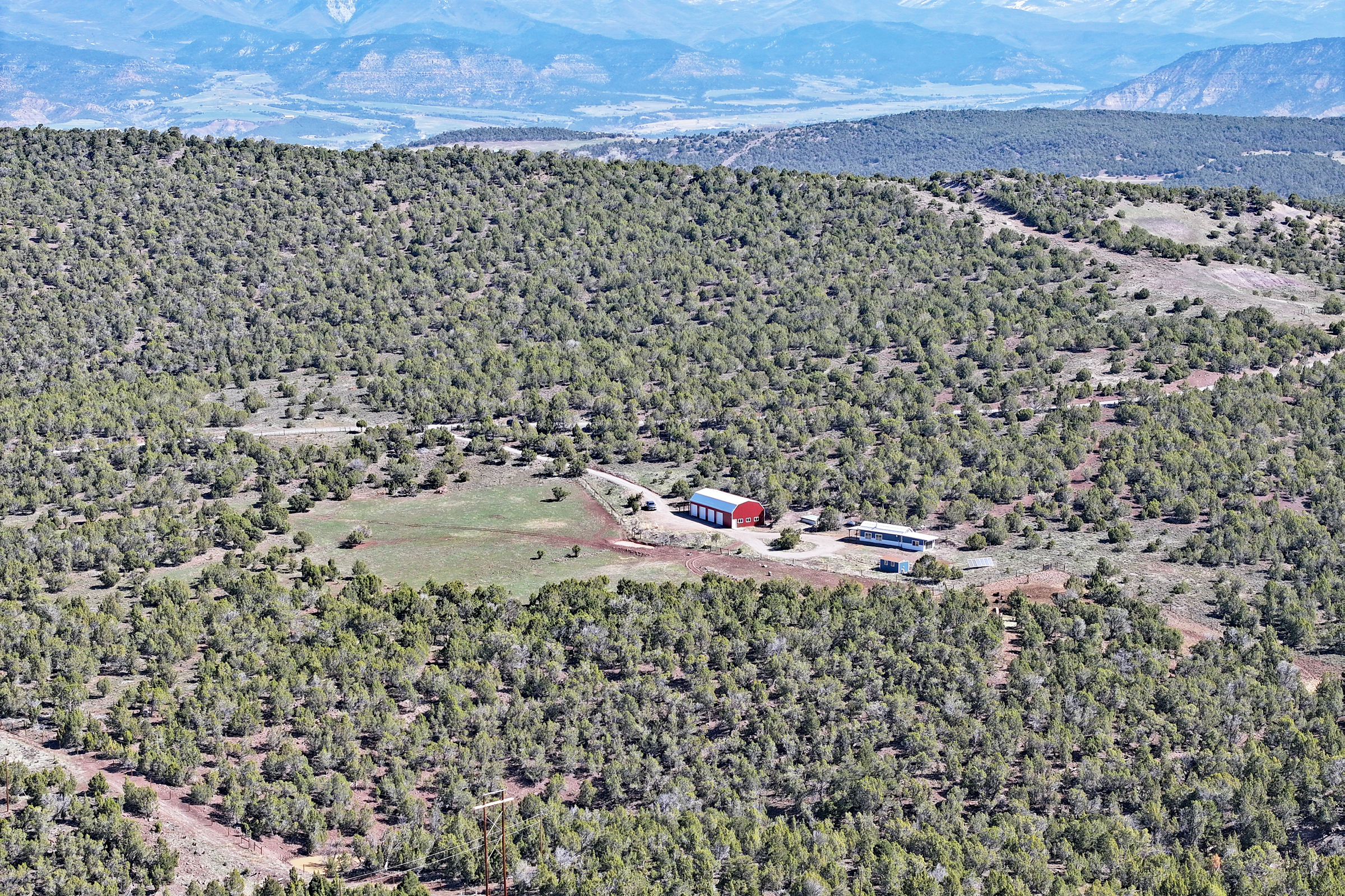 Home, Shop, Acreage with Ponds in 2 Parcels For Sale in Mesa County
