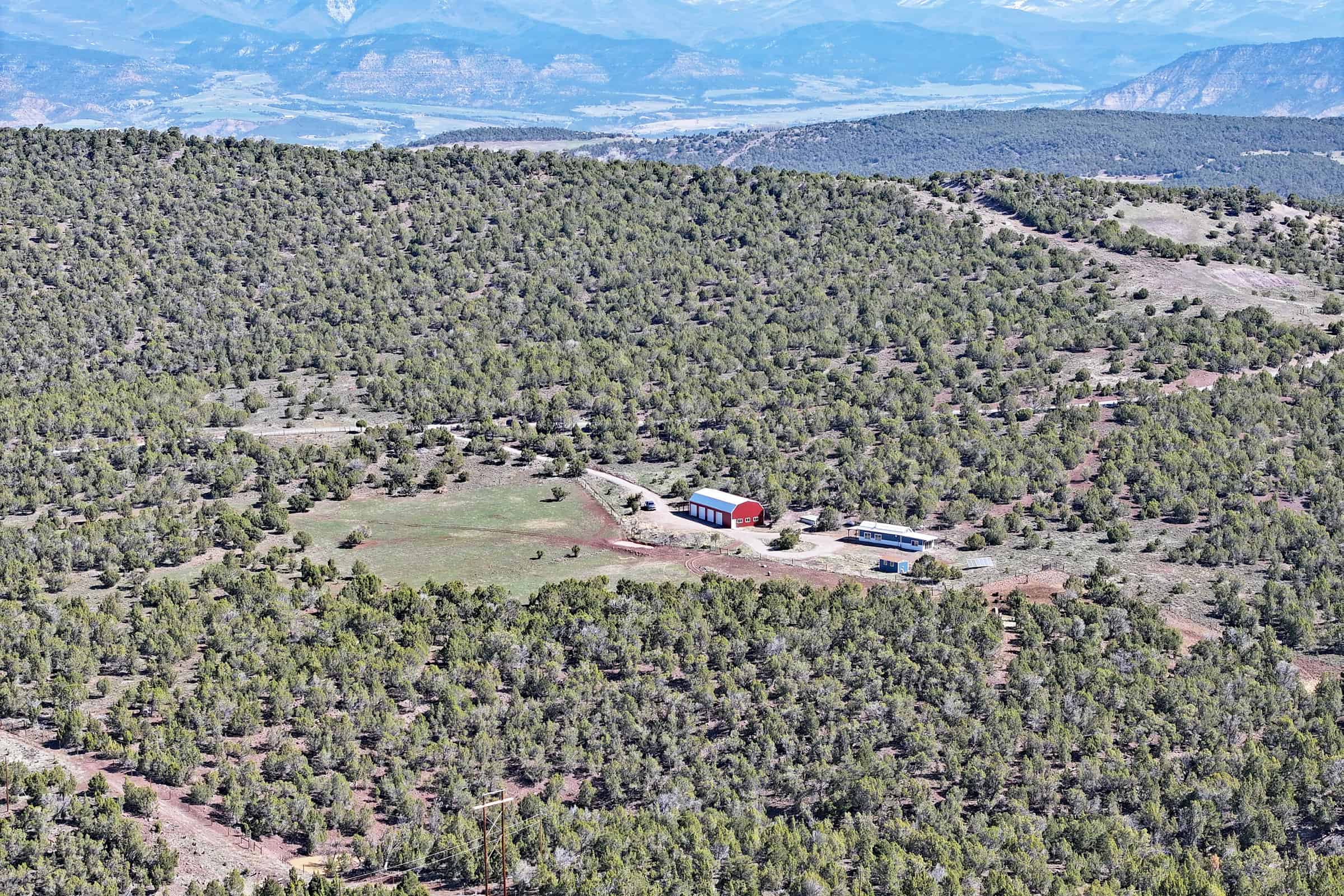Home, Shop, Acreage with Ponds in 2 Parcels For Sale in Mesa County