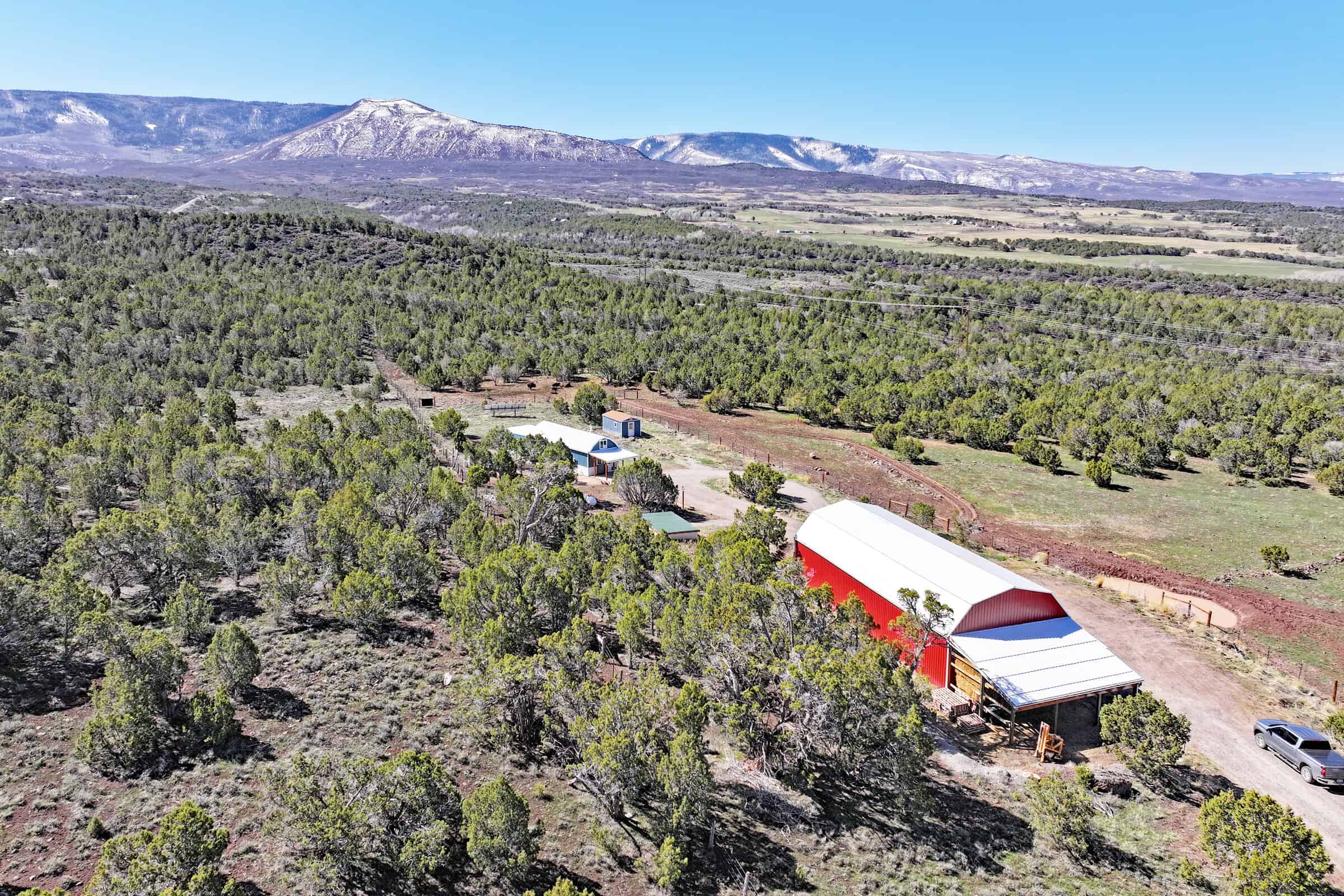 Home, Shop, Acreage with Ponds in 2 Parcels For Sale in Mesa County