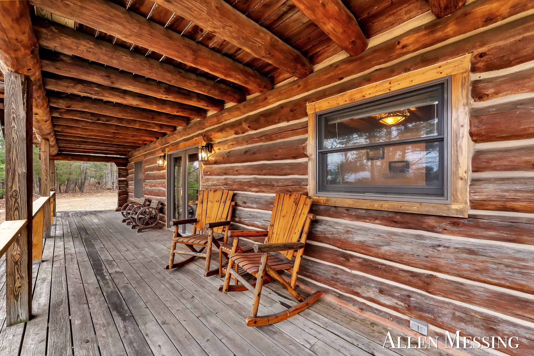 Custom Log Home on 10+ Acres with private Muskegon river frontage