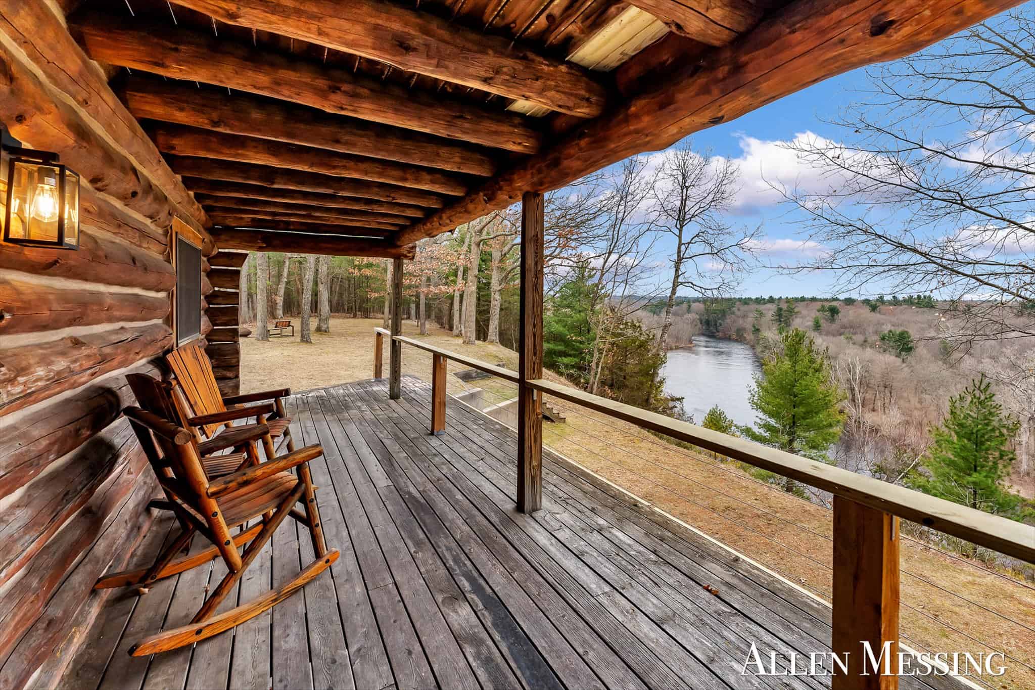 Custom Log Home on 10+ Acres with private Muskegon river frontage