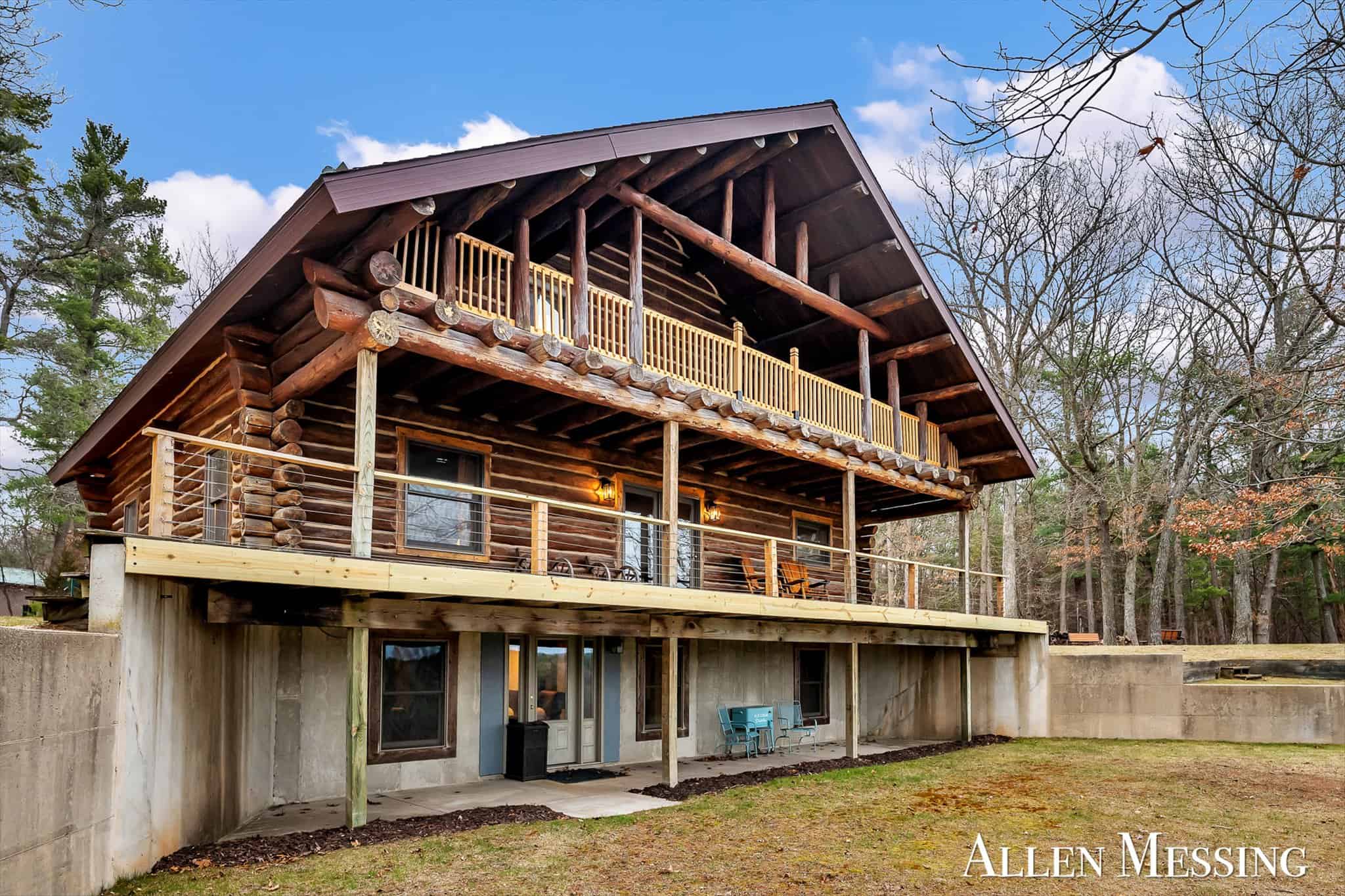 Custom Log Home on 10+ Acres with private Muskegon river frontage