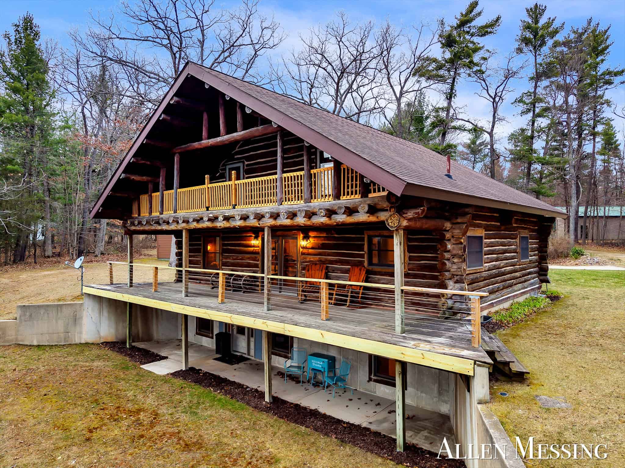Custom Log Home on 10+ Acres with private Muskegon river frontage