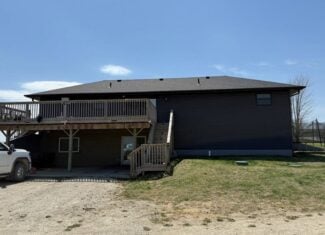 Rural Home on Highway with 7 ± Acres – 1 Mile from Mount Ayr