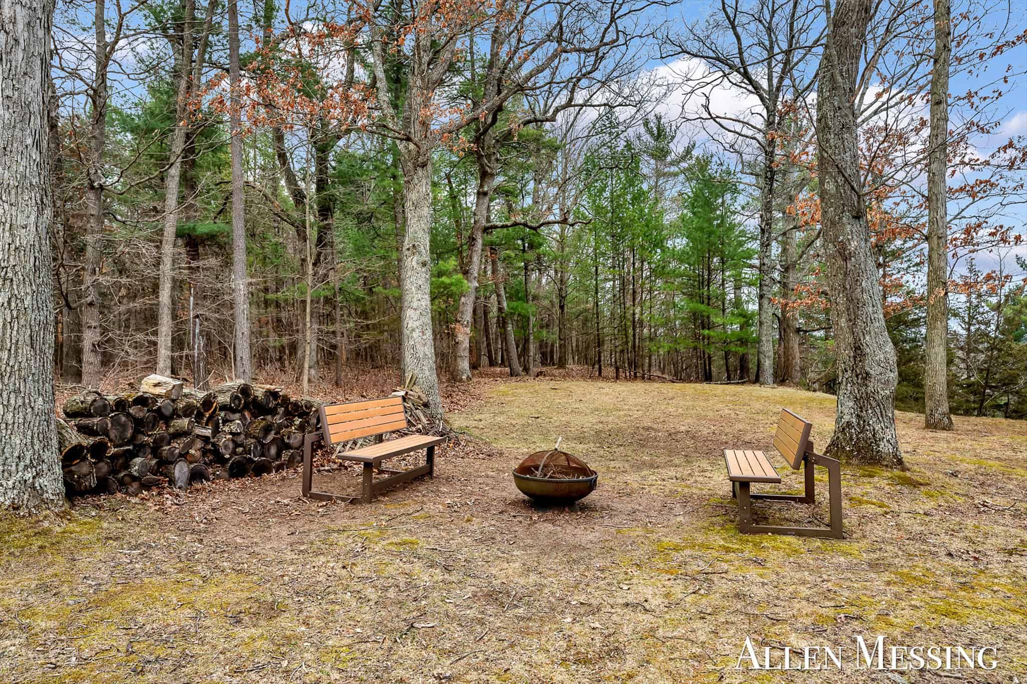Custom Log Home on 10+ Acres with private Muskegon river frontage