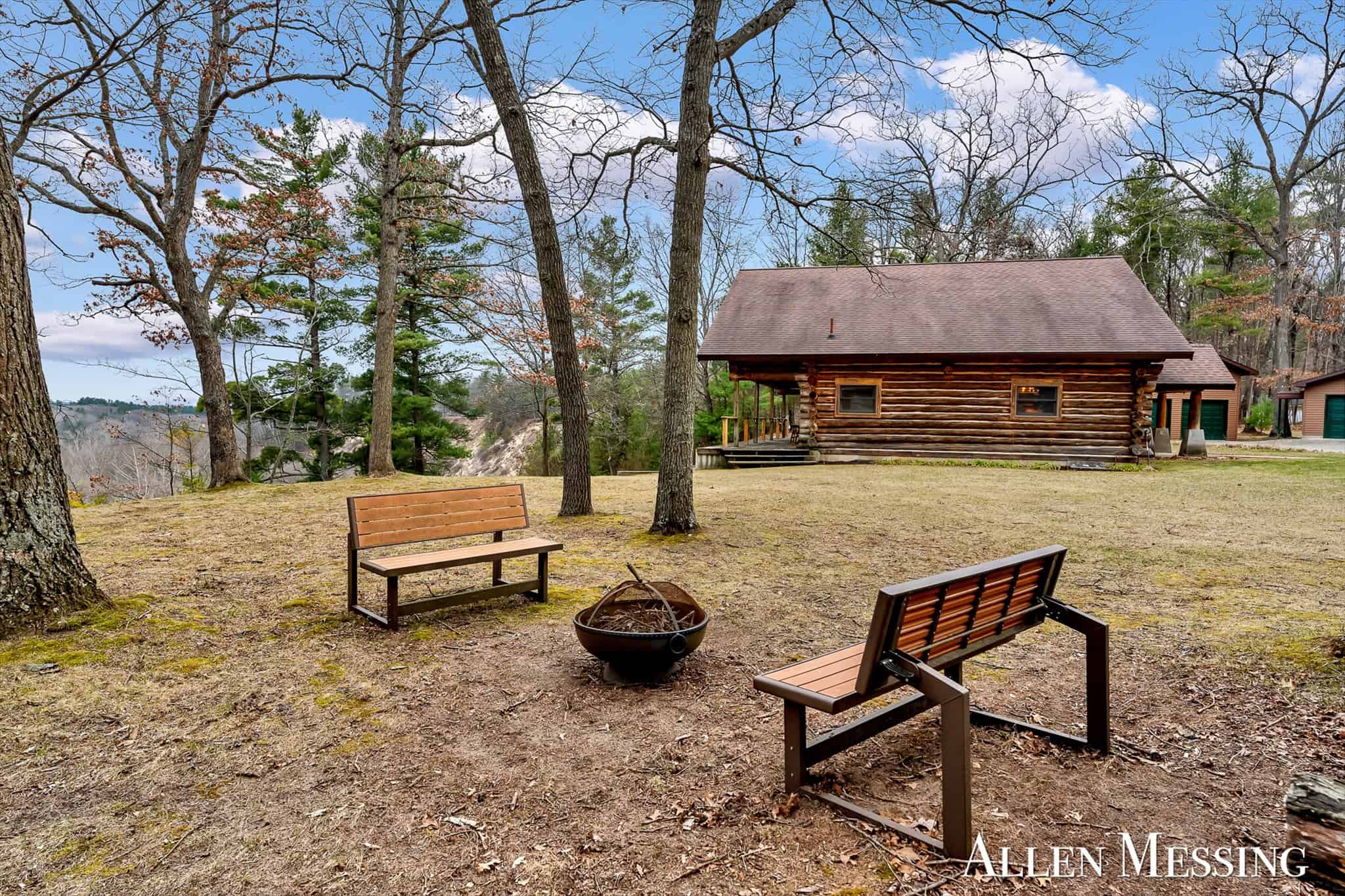 Custom Log Home on 10+ Acres with private Muskegon river frontage