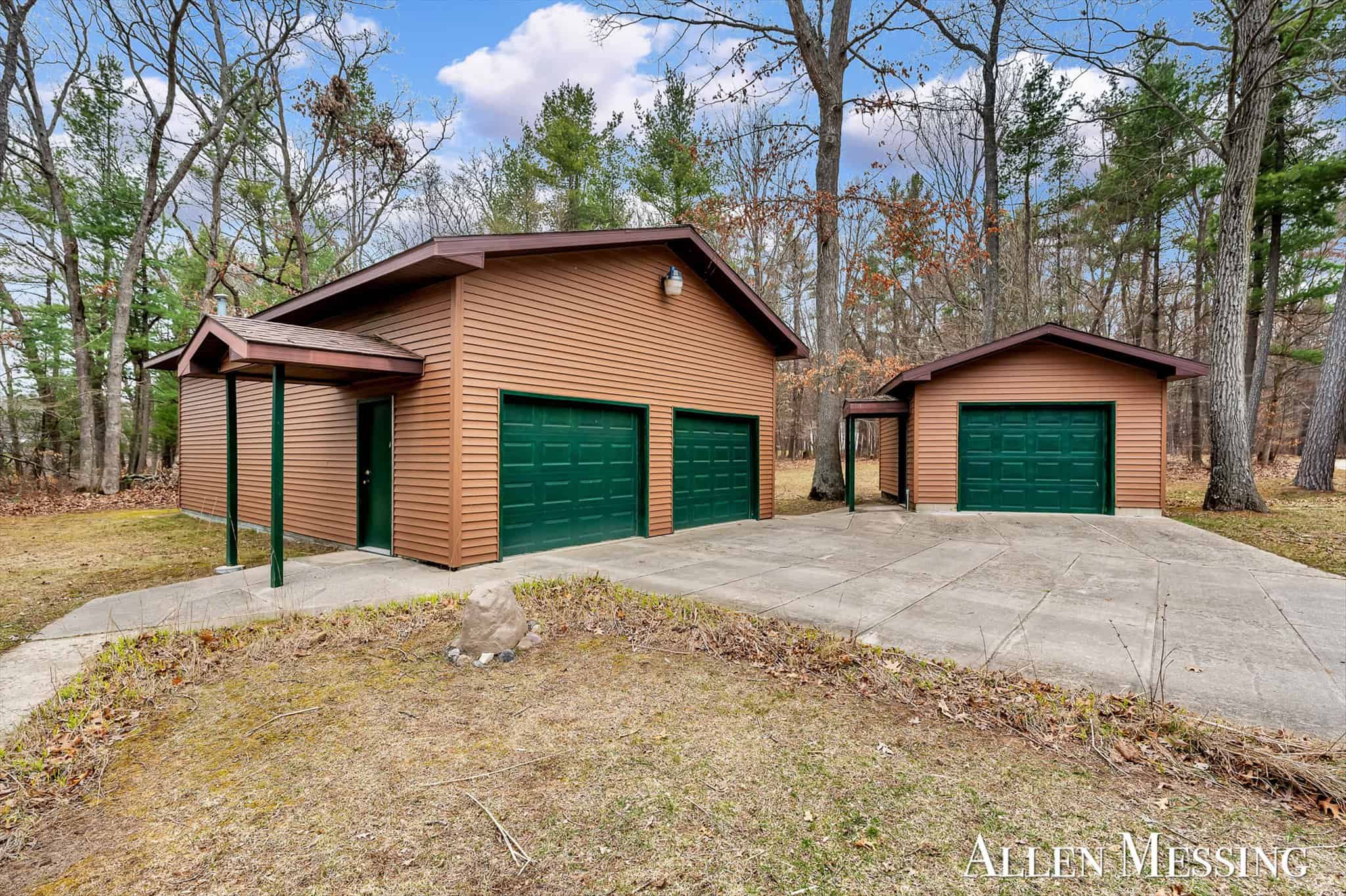 Custom Log Home on 10+ Acres with private Muskegon river frontage