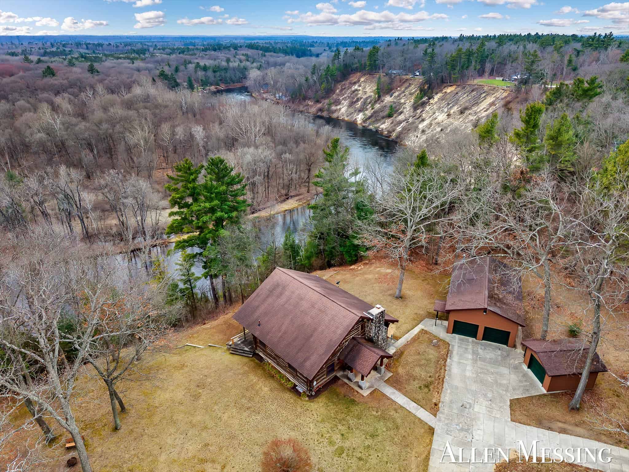Custom Log Home on 10+ Acres with private Muskegon river frontage