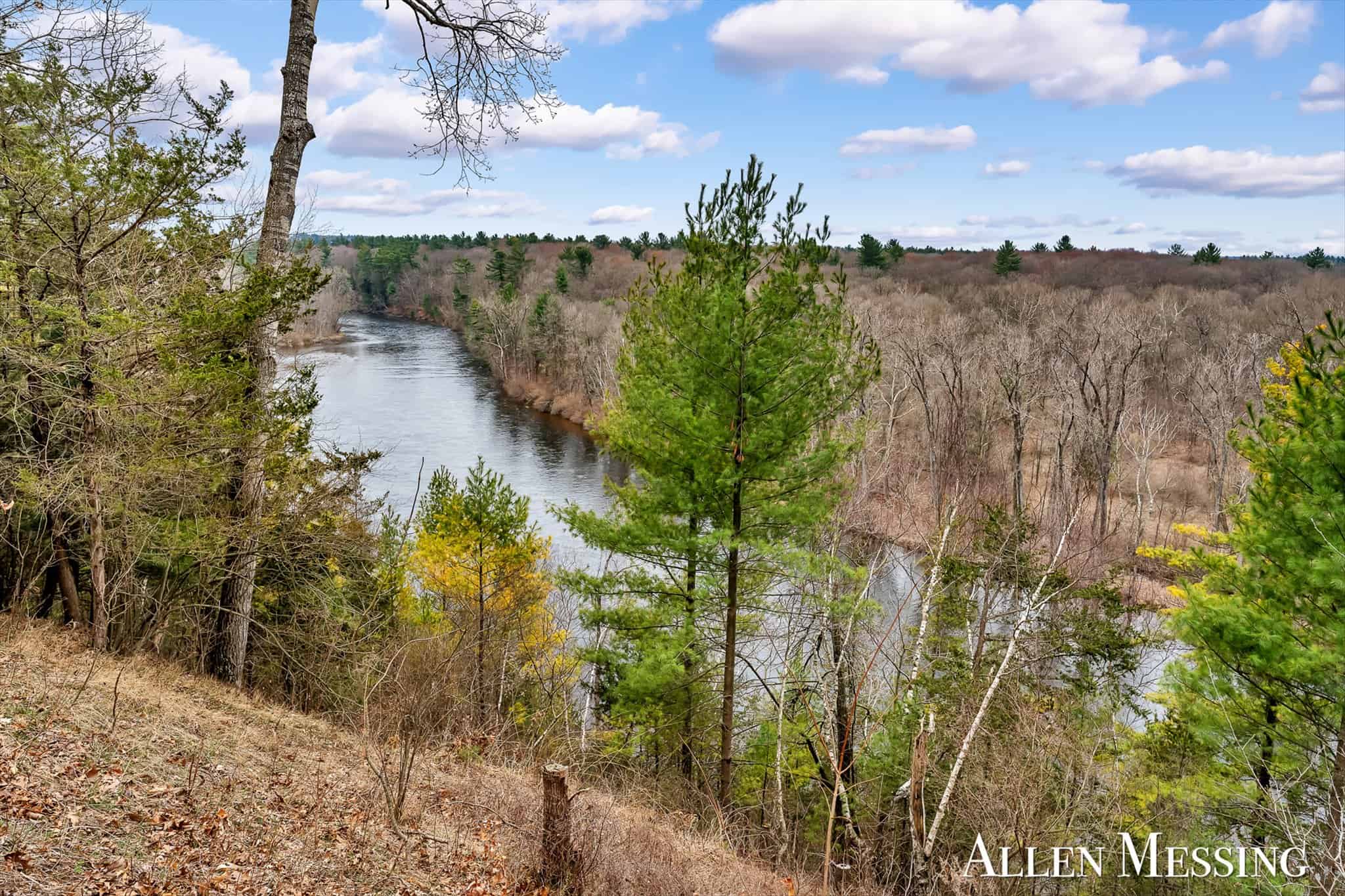 Custom Log Home on 10+ Acres with private Muskegon river frontage