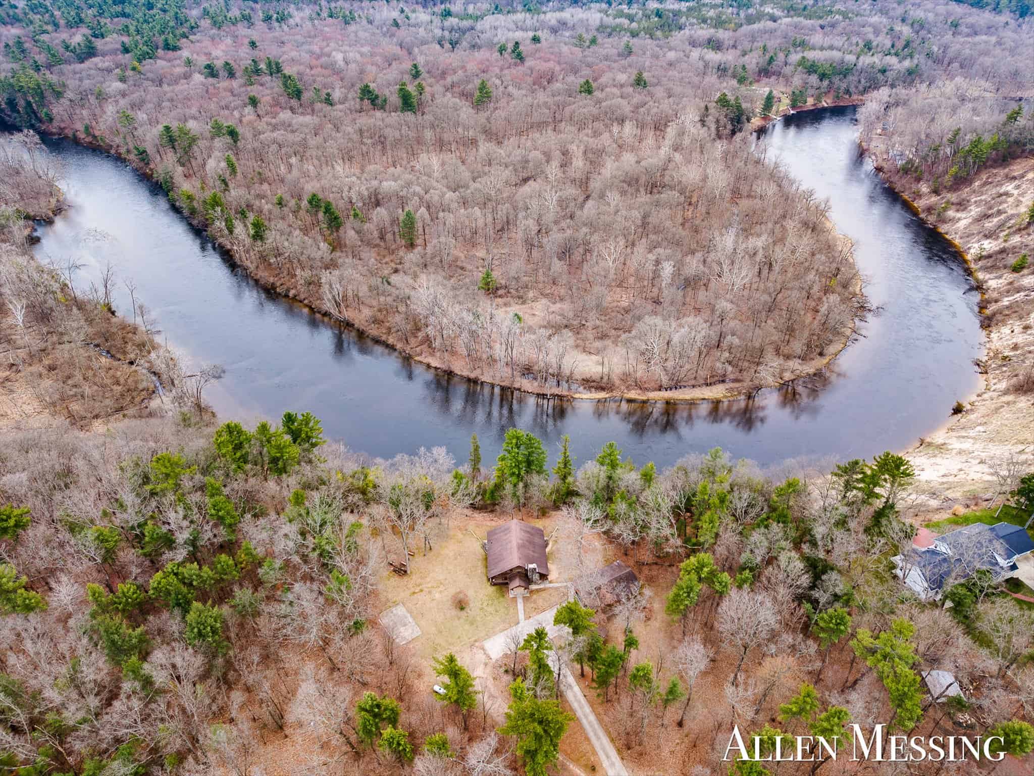 Custom Log Home on 10+ Acres with private Muskegon river frontage