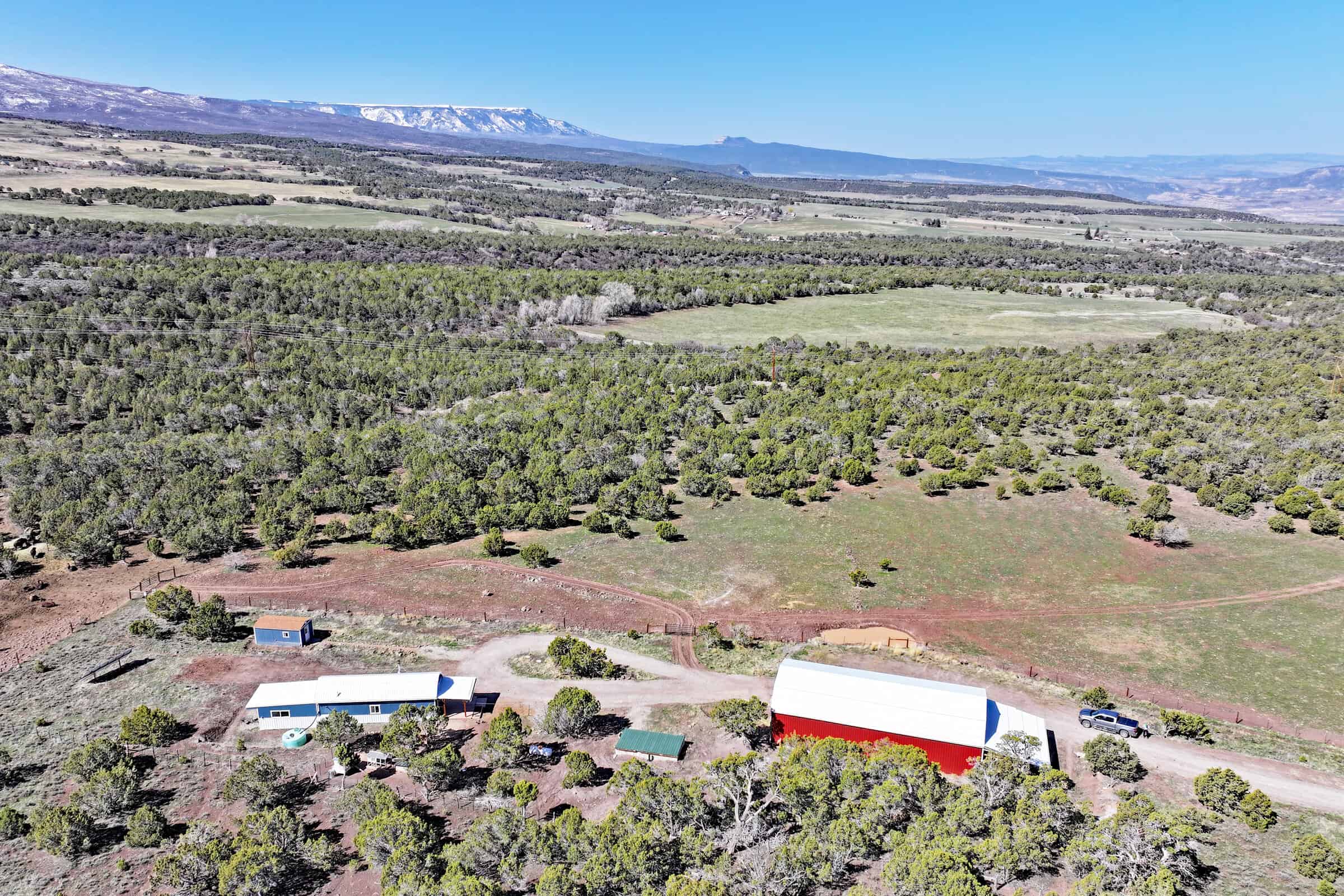 Home, Shop, Acreage with Ponds in 2 Parcels For Sale in Mesa County