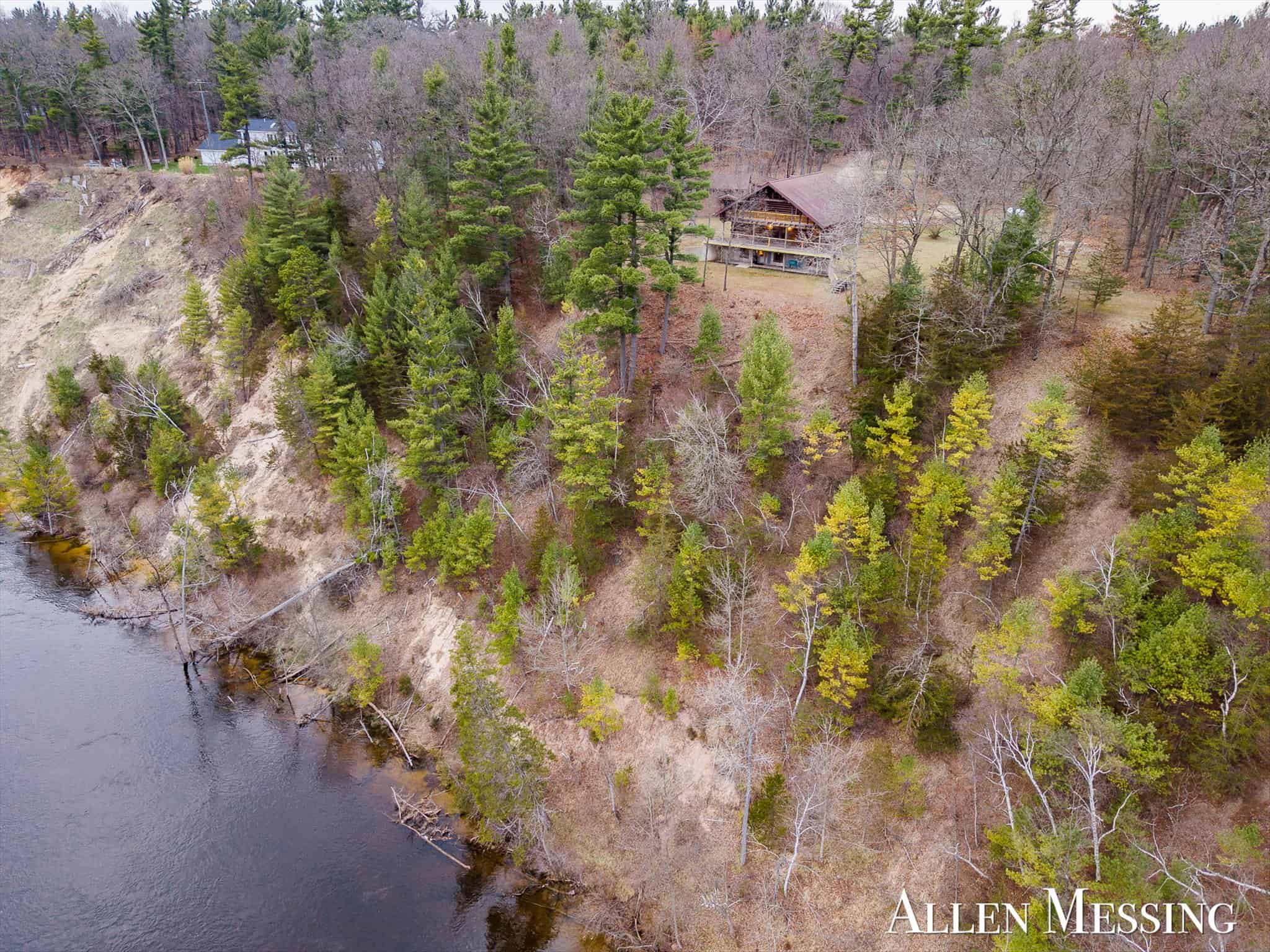 Custom Log Home on 10+ Acres with private Muskegon river frontage