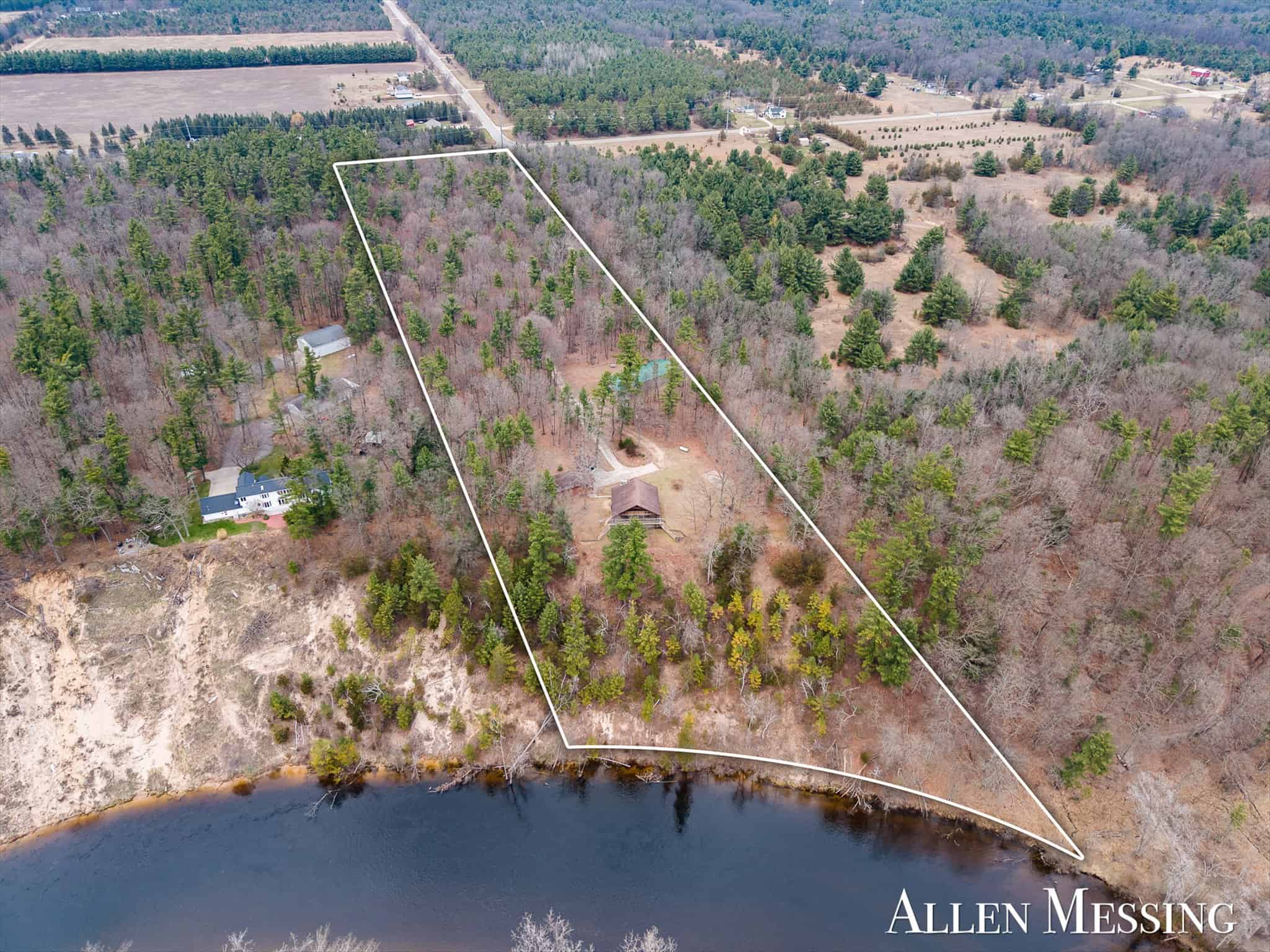 Custom Log Home on 10+ Acres with private Muskegon river frontage