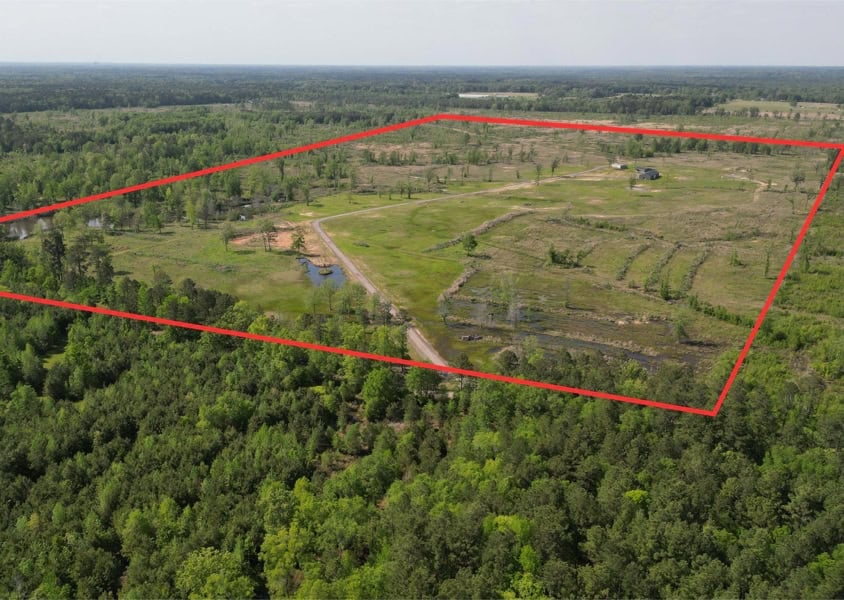 Arkansas Retreat – 100 Acres with New Home, Shop & Private Lake