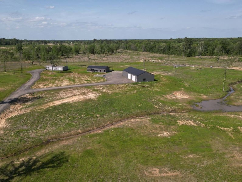 Arkansas Retreat – 100 Acres with New Home, Shop & Private Lake