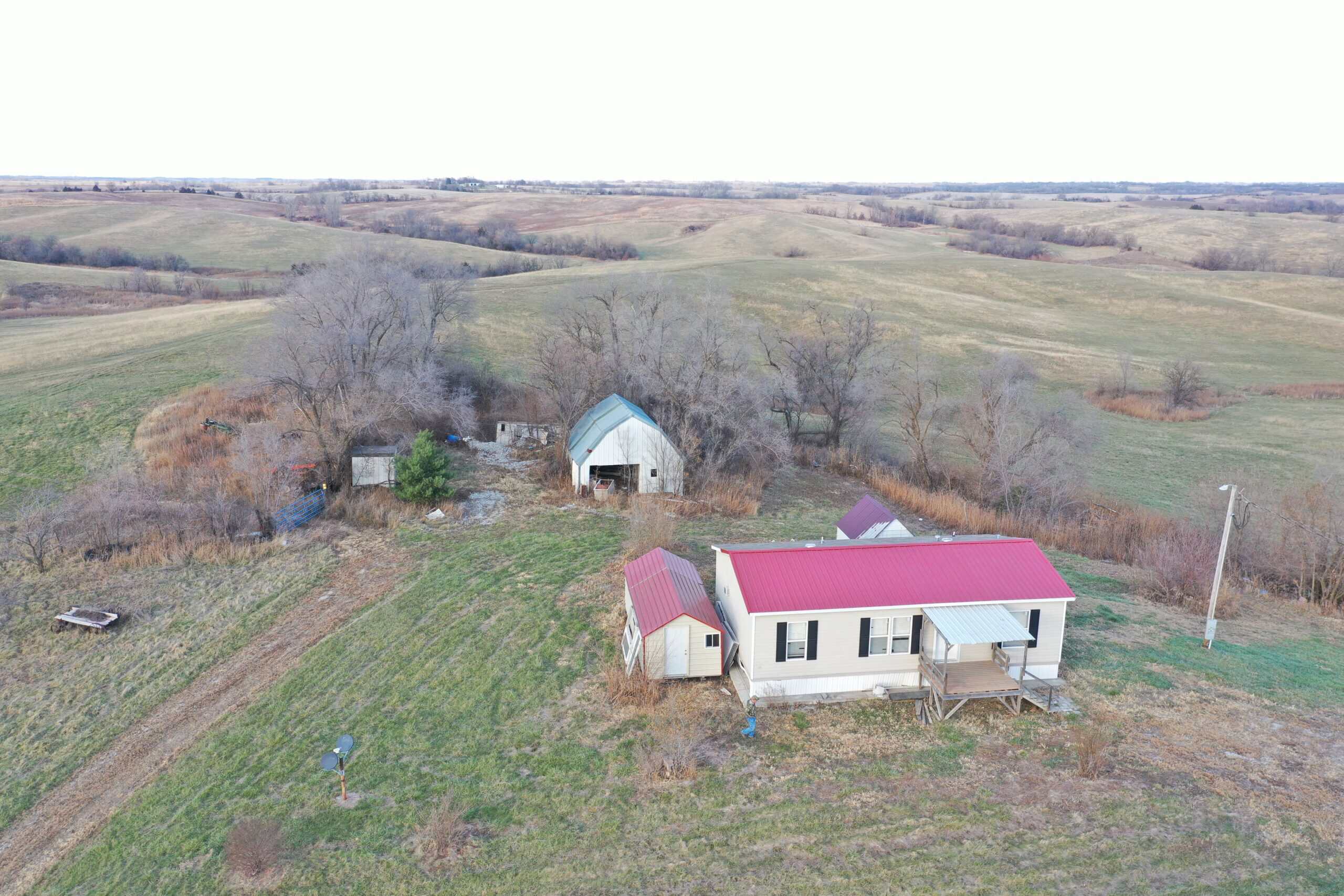 160 Acres with Home & 5 Acre Lake