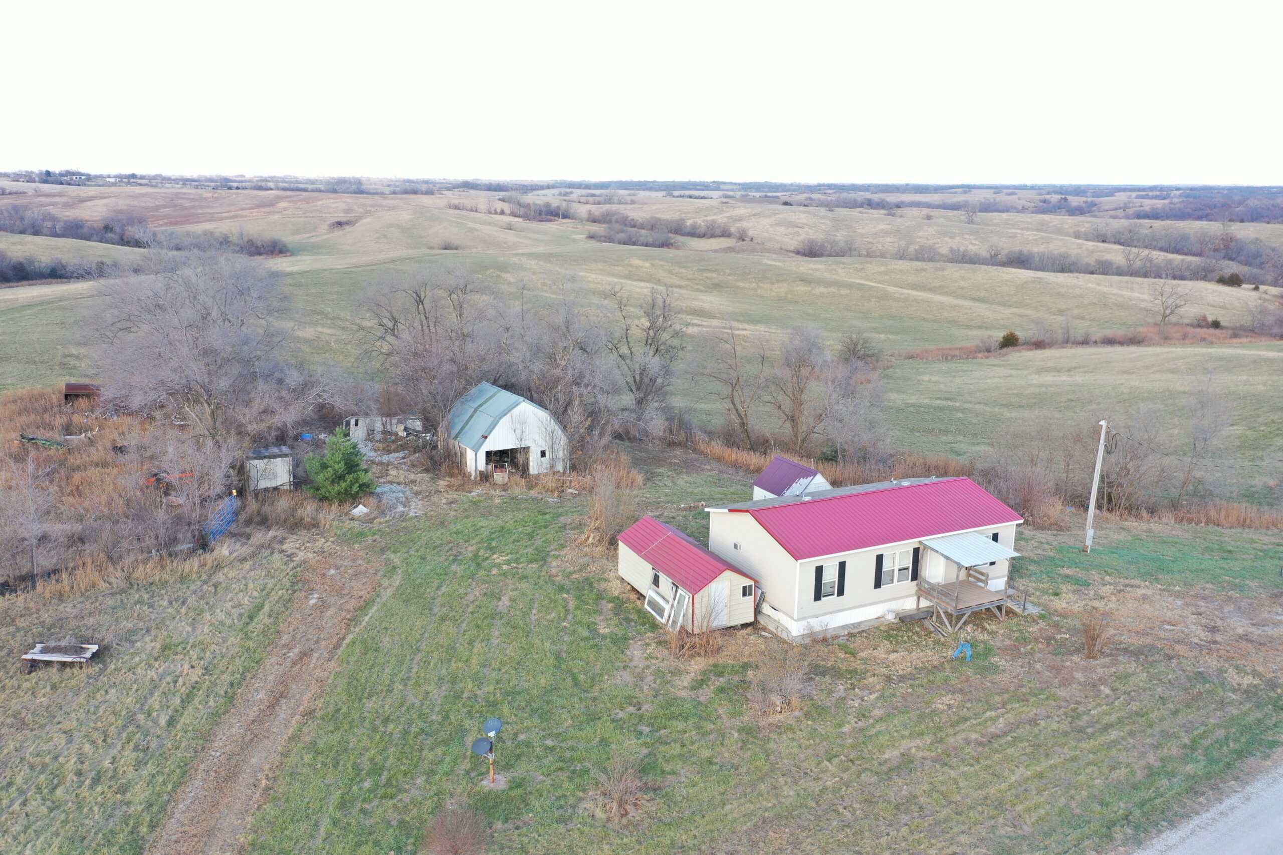 160 Acres with Home & 5 Acre Lake