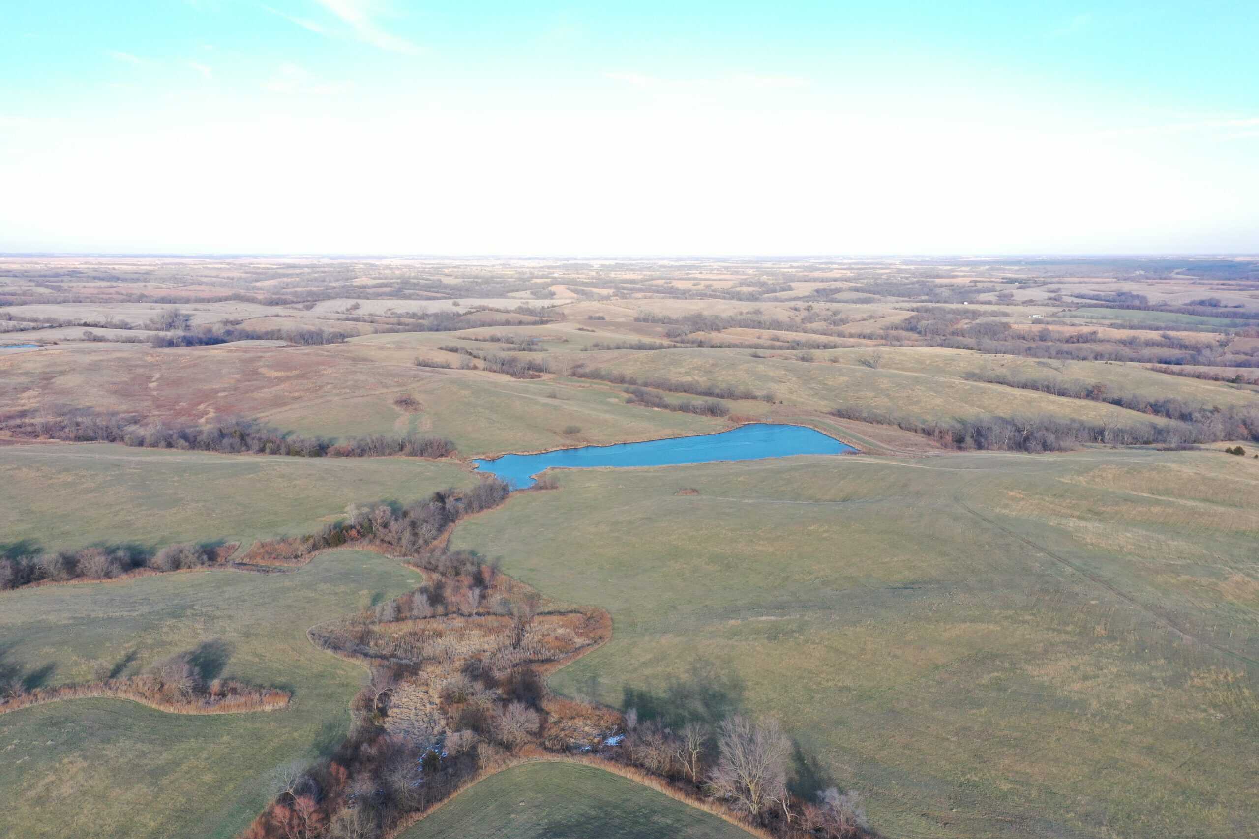 160 Acres with Home & 5 Acre Lake