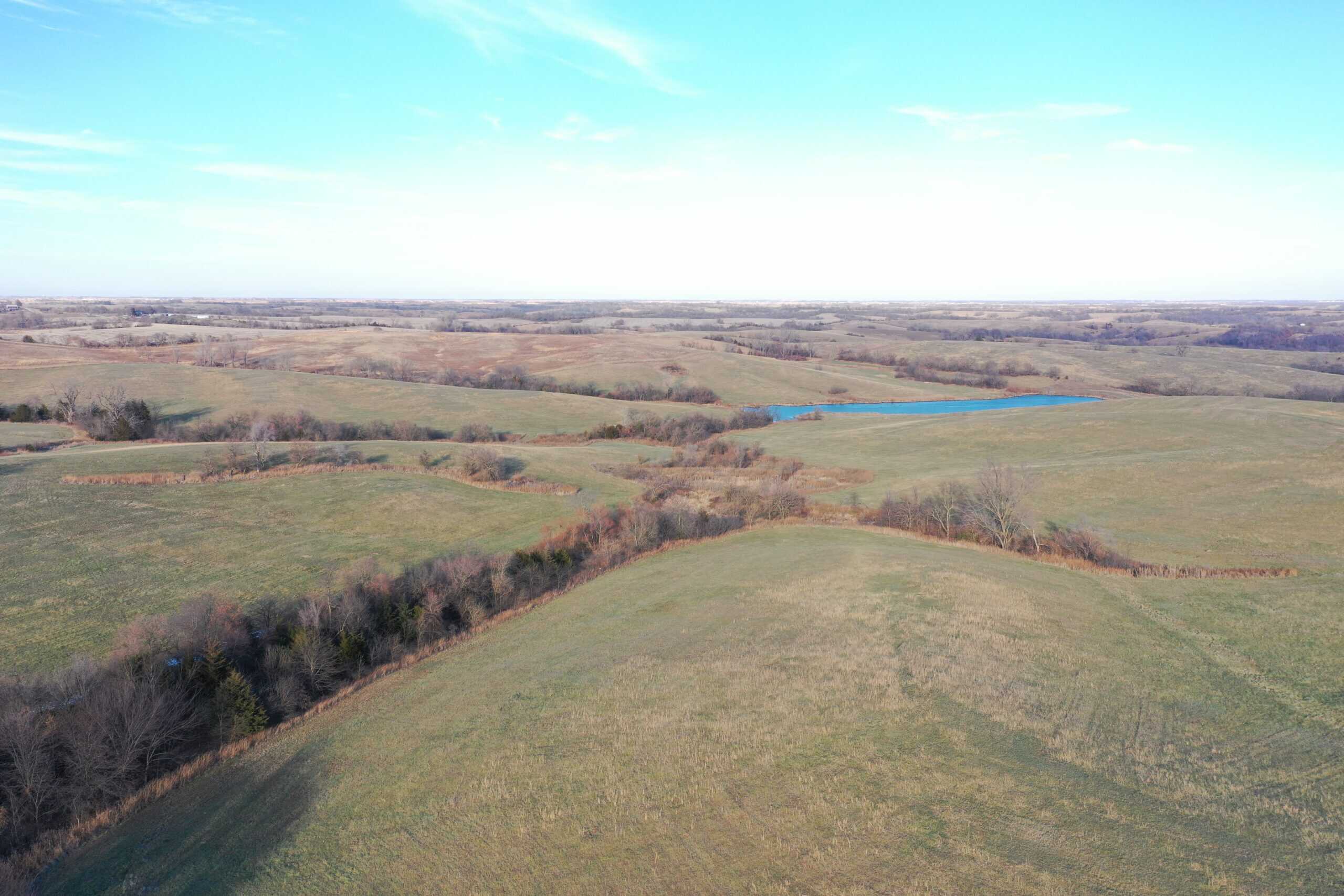 160 Acres with Home & 5 Acre Lake