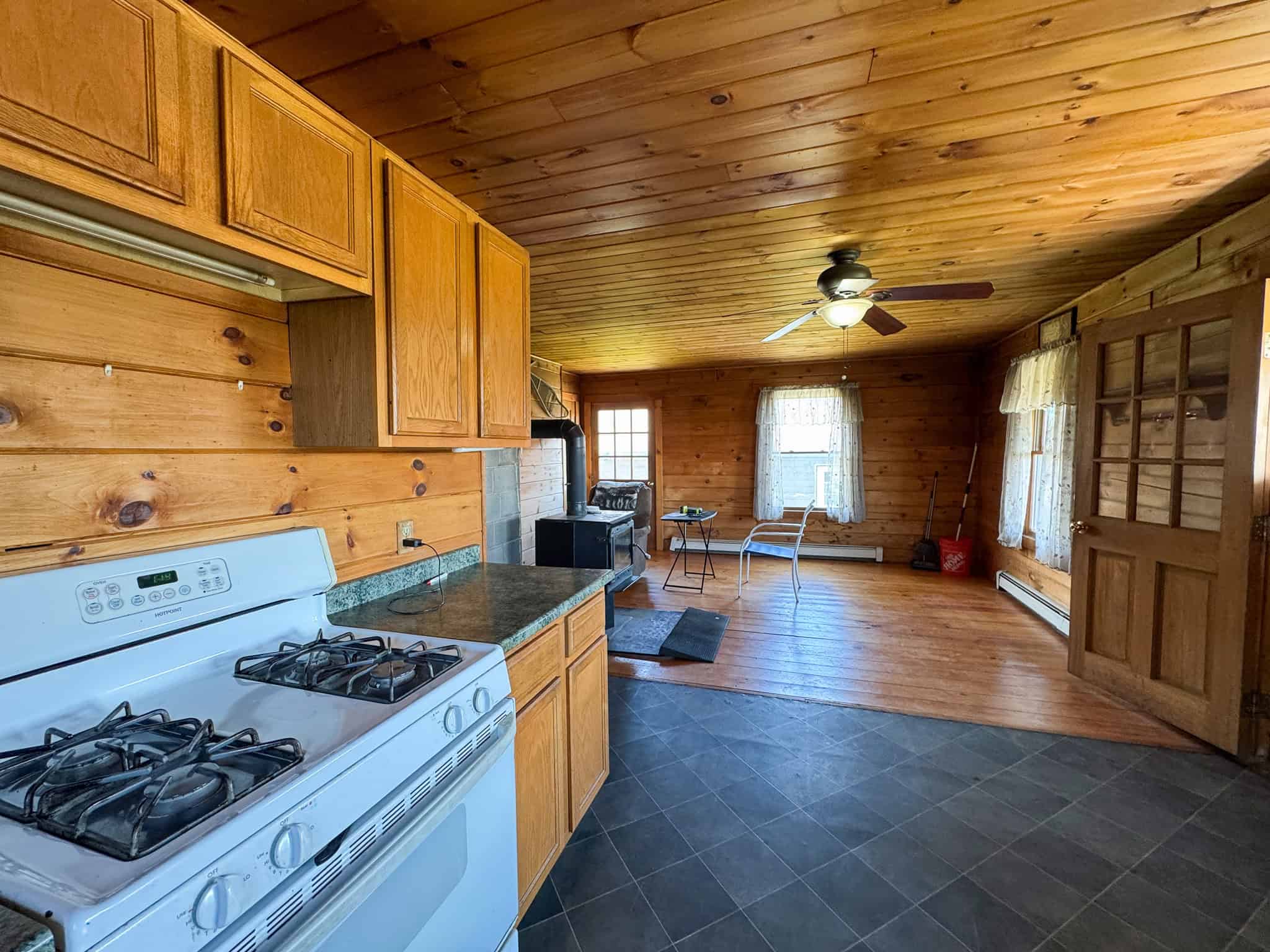 Off-Grid Log Cabin Retreat on 65± Acres