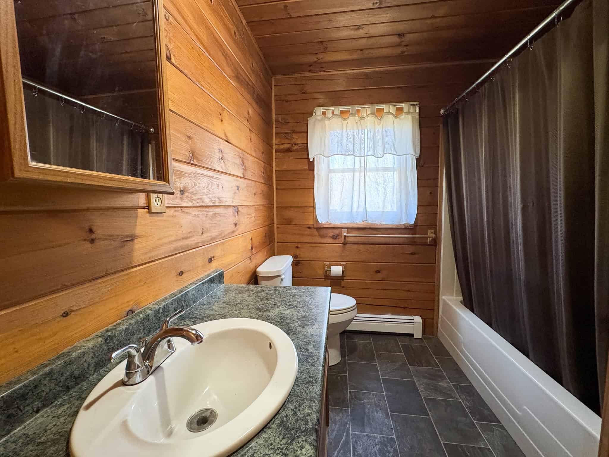 Off-Grid Log Cabin Retreat on 65± Acres