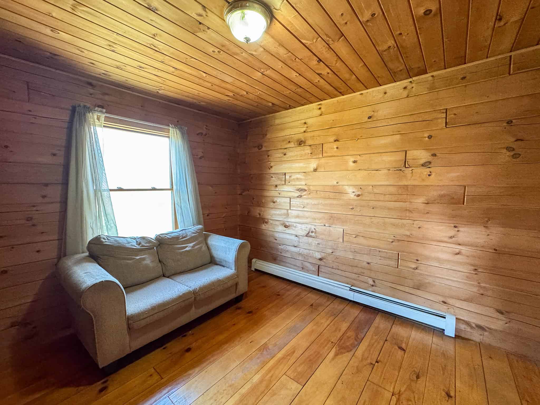 Off-Grid Log Cabin Retreat on 65± Acres