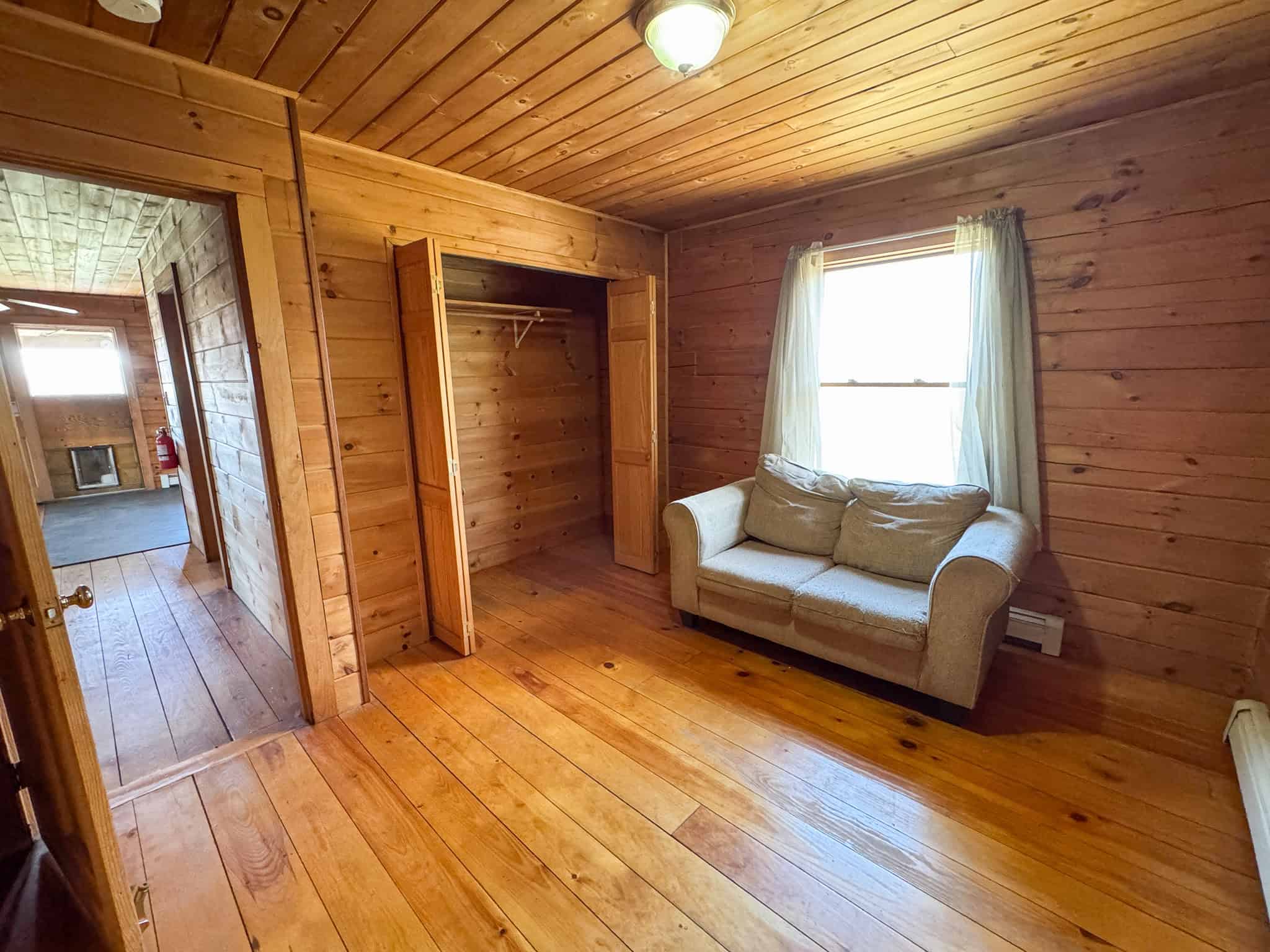 Off-Grid Log Cabin Retreat on 65± Acres