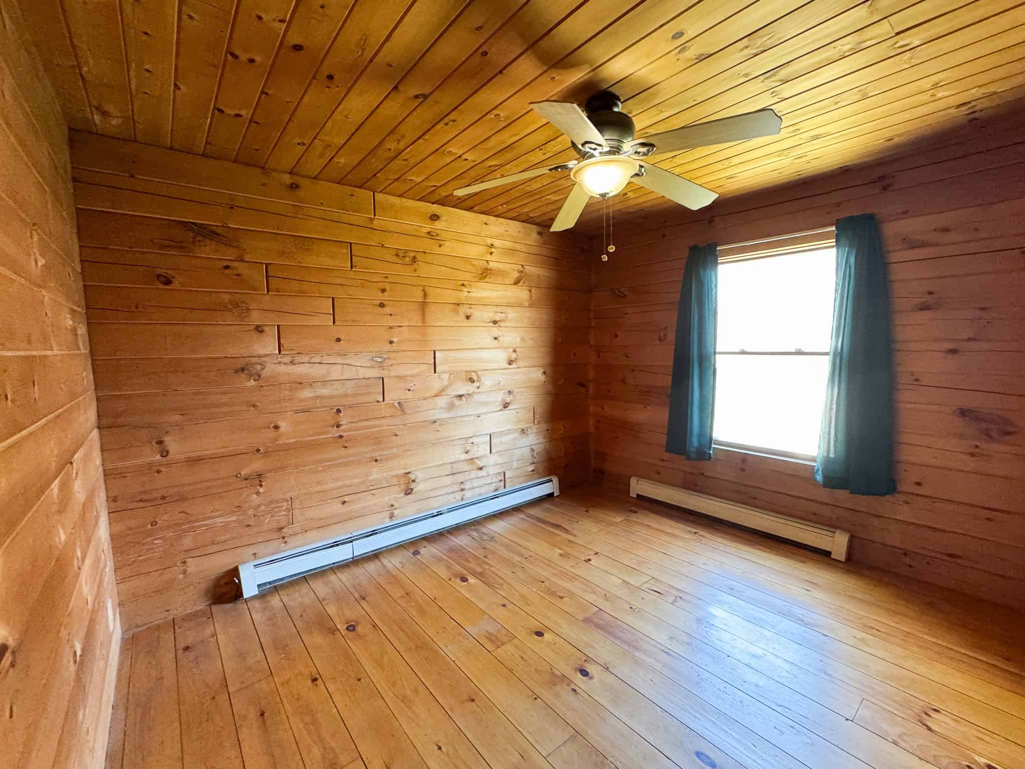 Off-Grid Log Cabin Retreat on 65± Acres