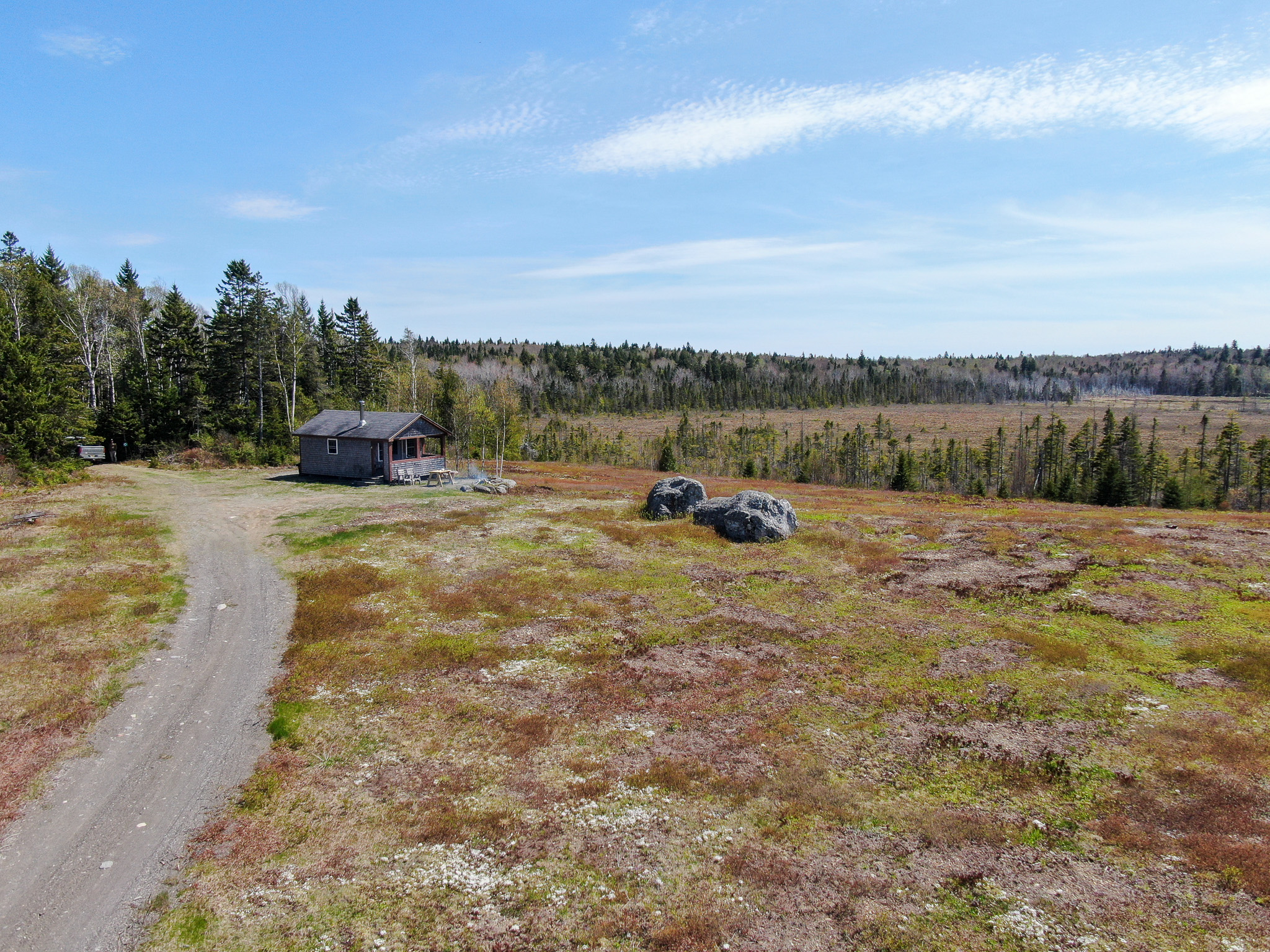 120± Acres of Land with Camp and Blueberry Field