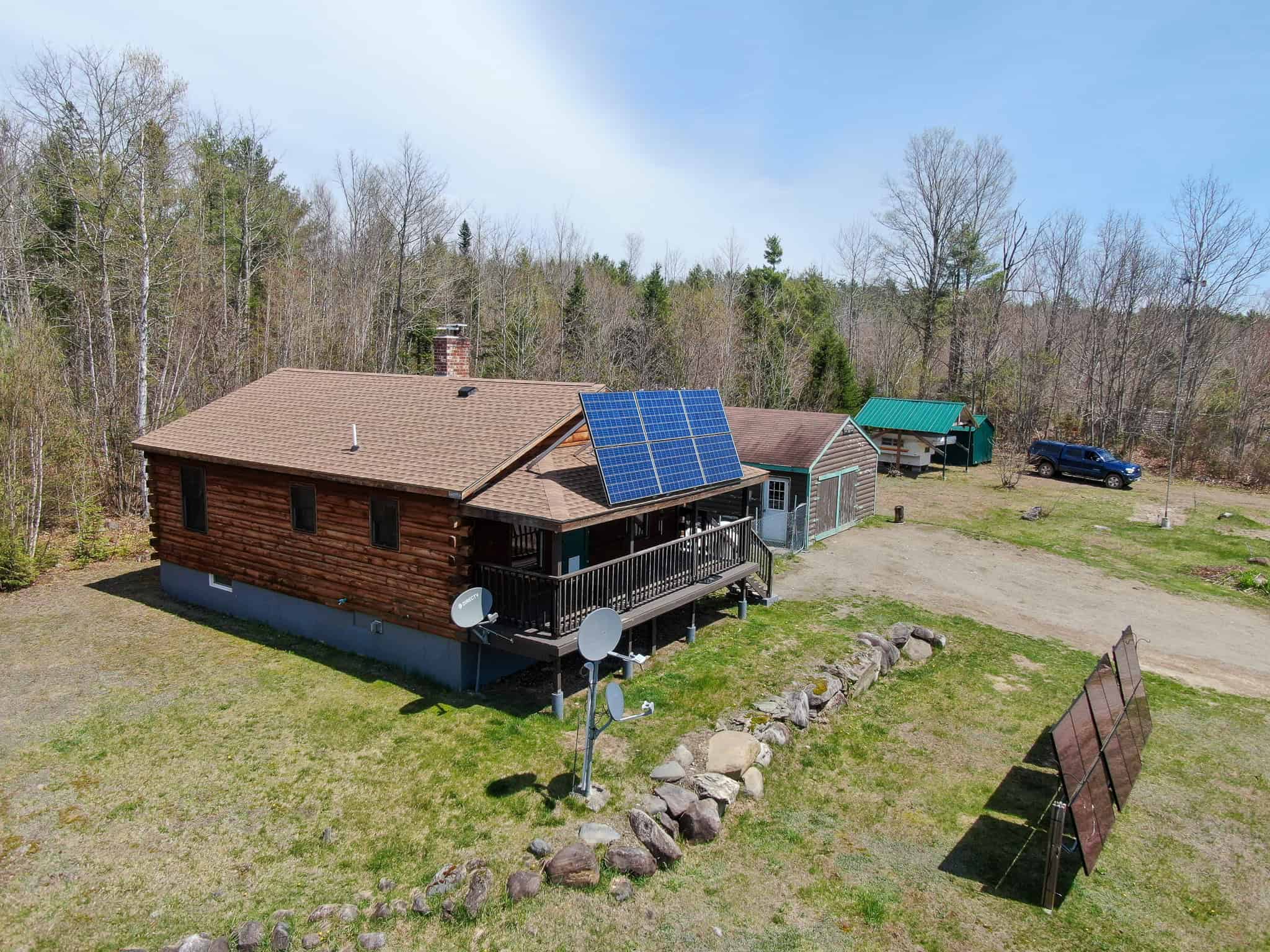 Off-Grid Log Cabin Retreat on 65± Acres