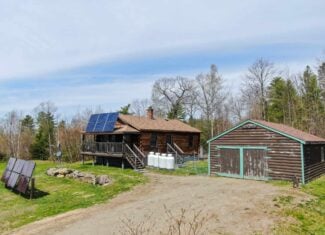 Off-Grid Log Cabin Retreat on 65± Acres