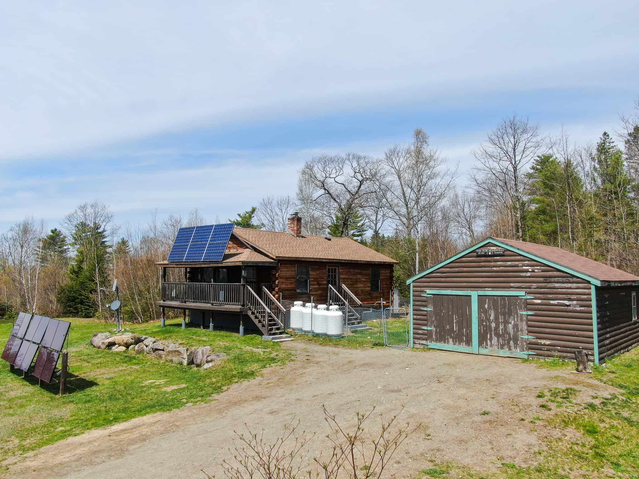 Off-Grid Log Cabin Retreat on 65± Acres