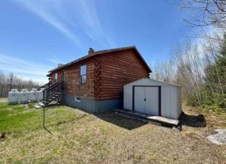 Off-Grid Log Cabin Retreat on 65± Acres