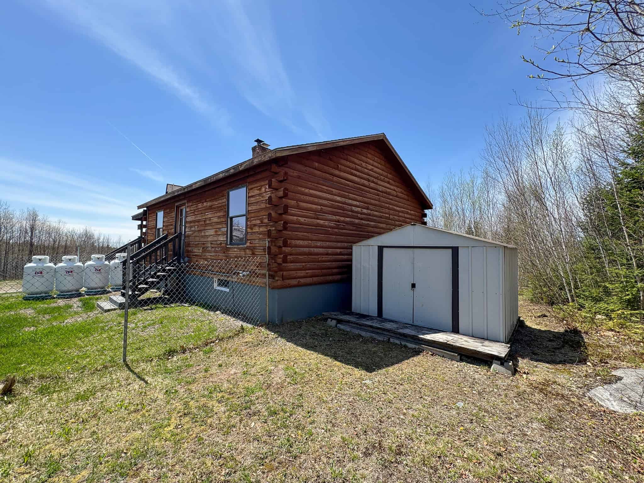 Off-Grid Log Cabin Retreat on 65± Acres