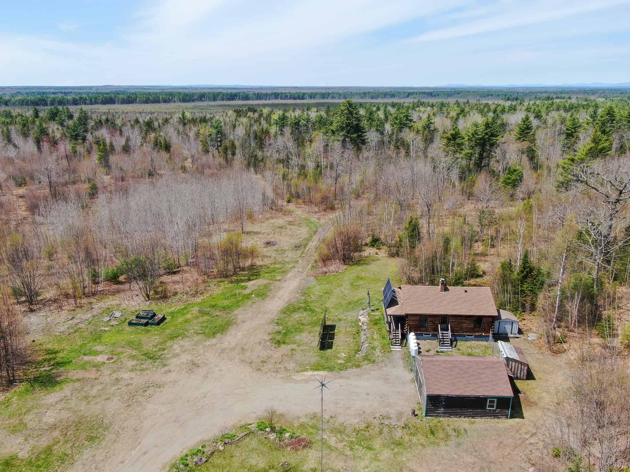 Off-Grid Log Cabin Retreat on 65± Acres