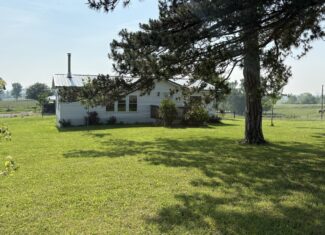 Charming Manufactured Home on 6.4 Acres with Outbuildings