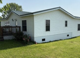 Charming Manufactured Home on 6.4 Acres with Outbuildings
