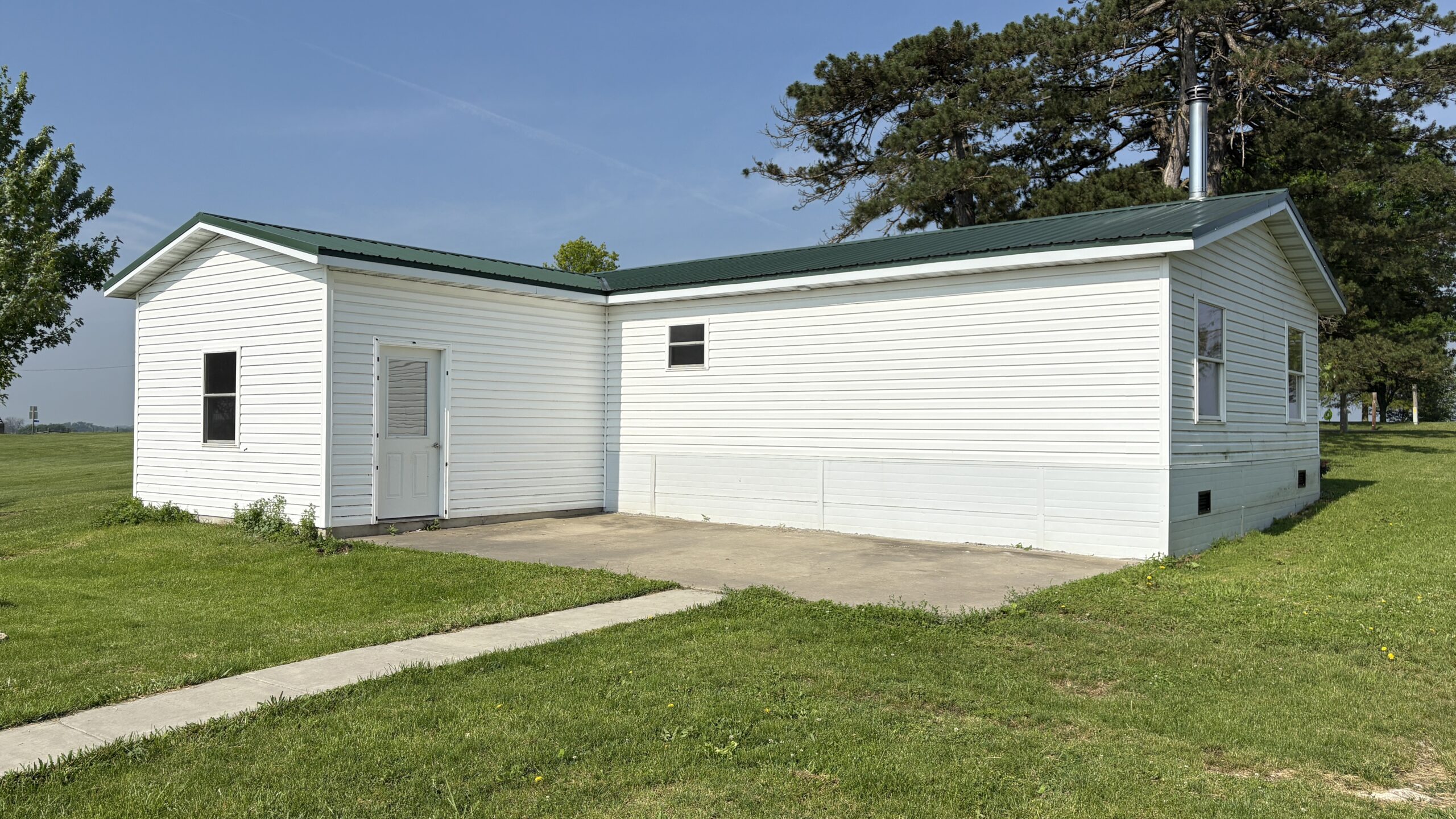 Charming Manufactured Home on 6.4 Acres with Outbuildings