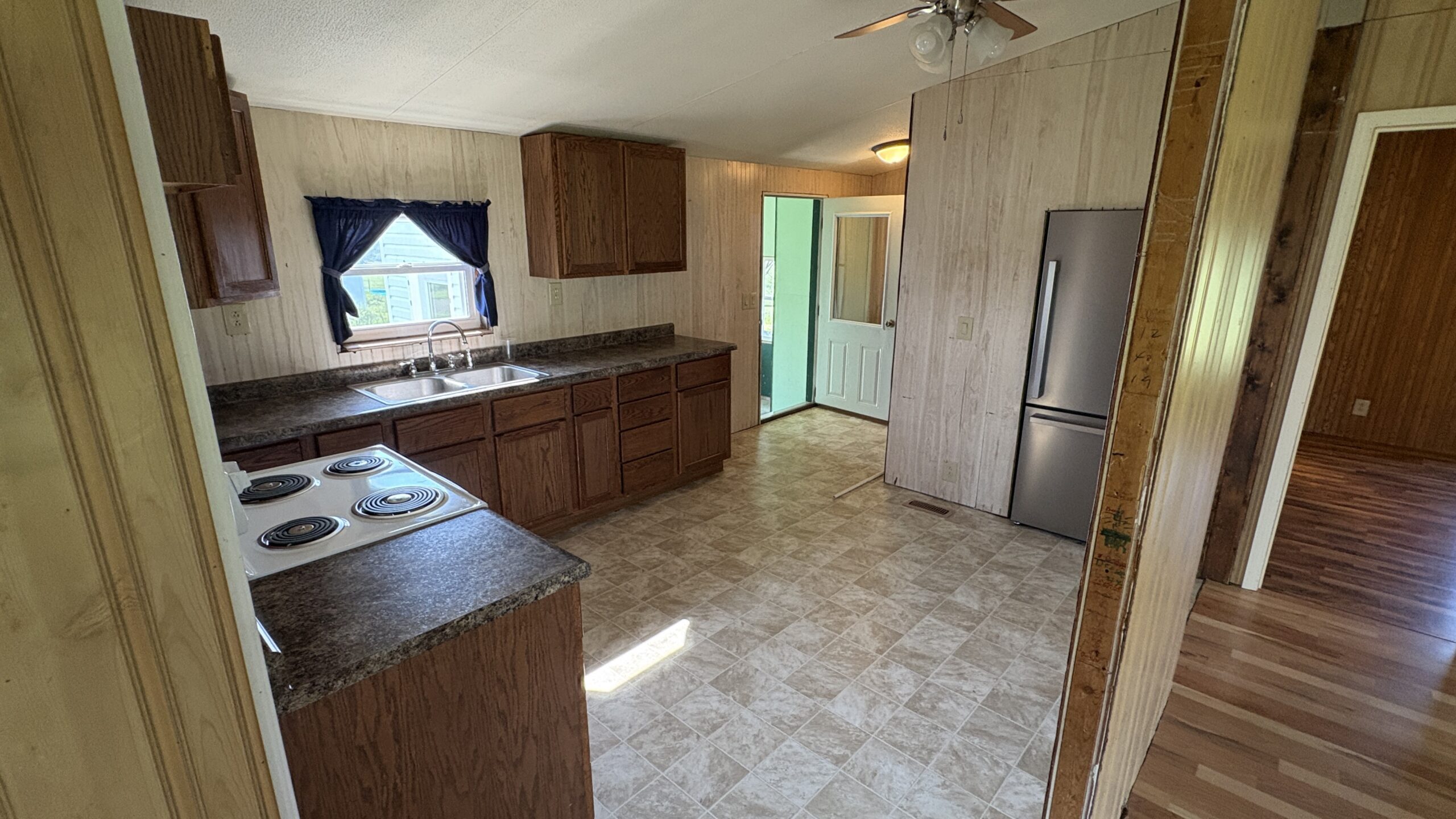 Charming Manufactured Home on 6.4 Acres with Outbuildings
