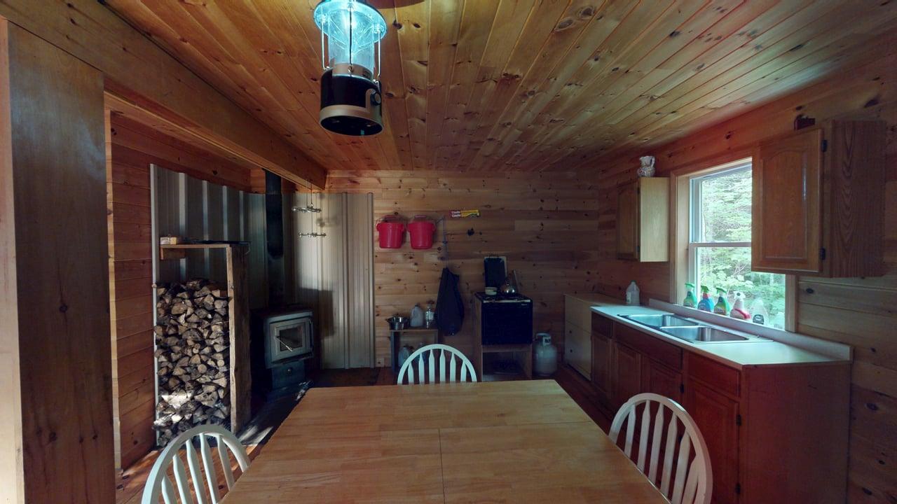 Off-Grid Cabin with 150± Acres Bordering Mount Chase