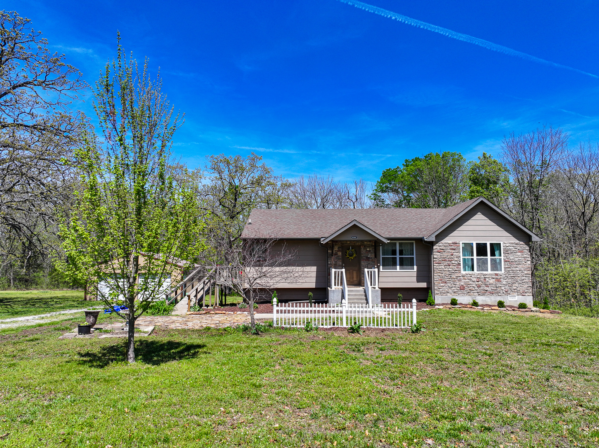 89+/- Acre Hunting property with a nice home and shop
