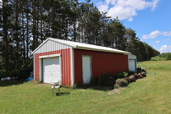 Hunter’s Paradise:  Cabin and Barn on 50 Acres Atlanta MI