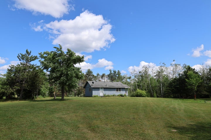 Hunter’s Paradise:  Cabin and Barn on 50 Acres Atlanta MI