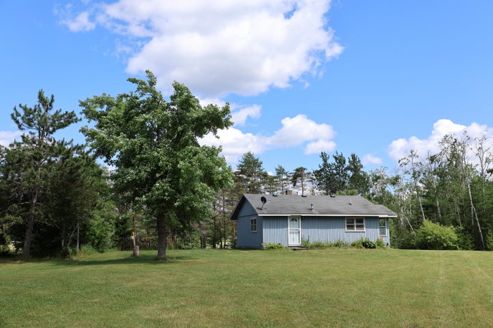 Hunter’s Paradise:  Cabin and Barn on 50 Acres Atlanta MI