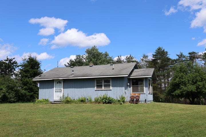 Hunter’s Paradise:  Cabin and Barn on 50 Acres Atlanta MI
