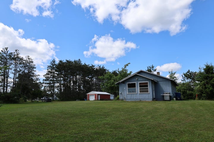 Hunter’s Paradise:  Cabin and Barn on 50 Acres Atlanta MI