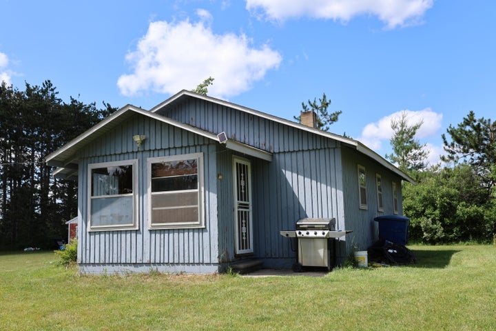 Hunter’s Paradise:  Cabin and Barn on 50 Acres Atlanta MI