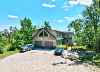 Luxury Home on 261 Acres – Atlanta, MI Wilderness Retreat