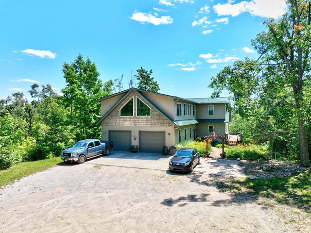 Luxury Home on 261 Acres – Atlanta, MI Wilderness Retreat