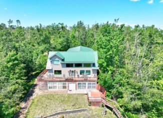 Luxury Home on 261 Acres – Atlanta, MI Wilderness Retreat